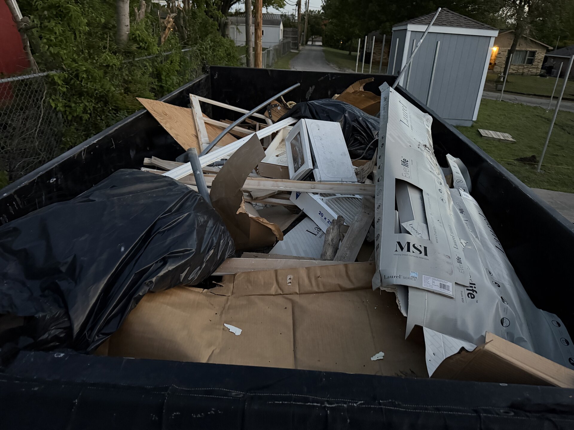 Side yard debris cleanup and haul-off — after