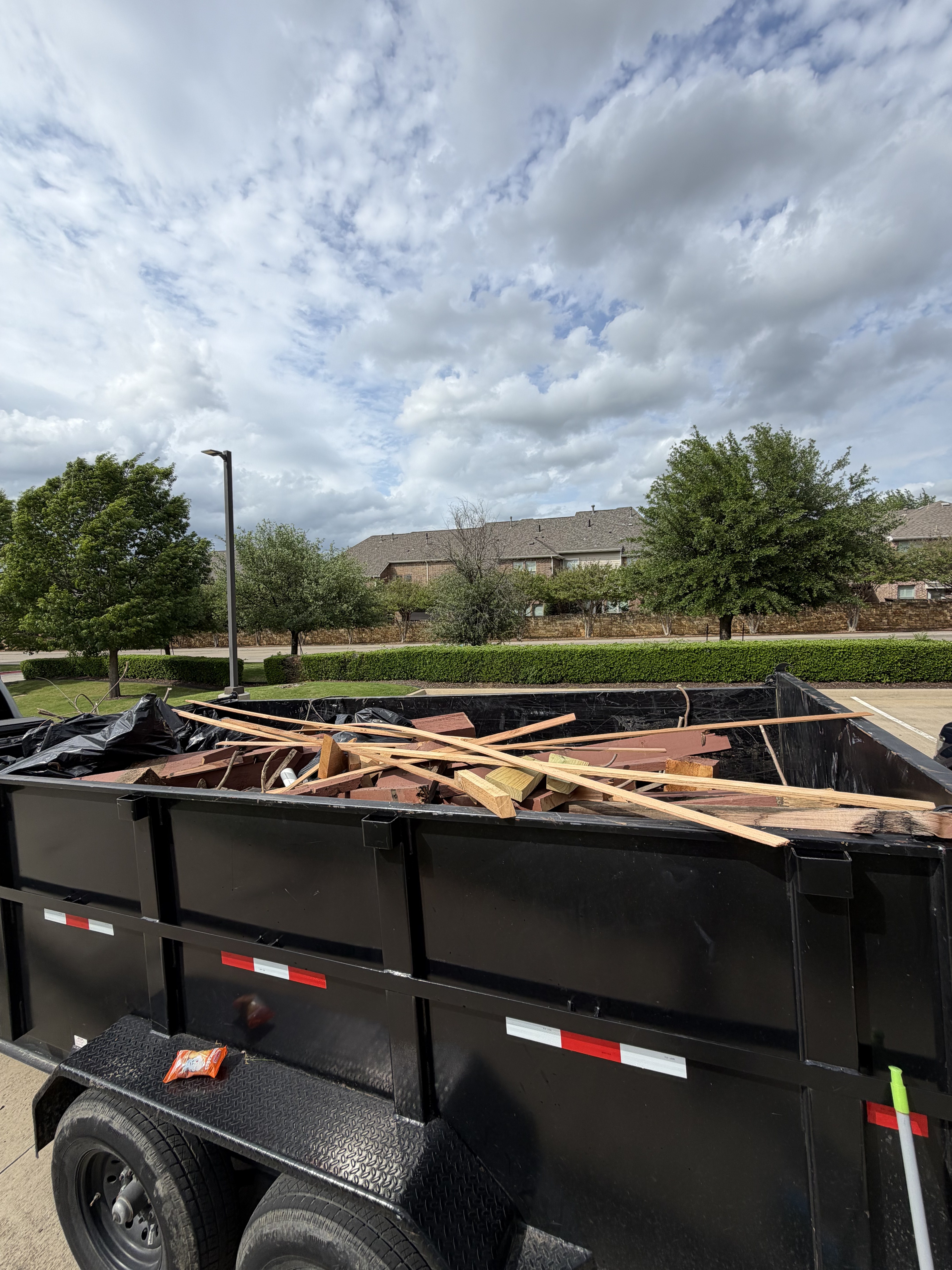 Debris loaded and hauled away