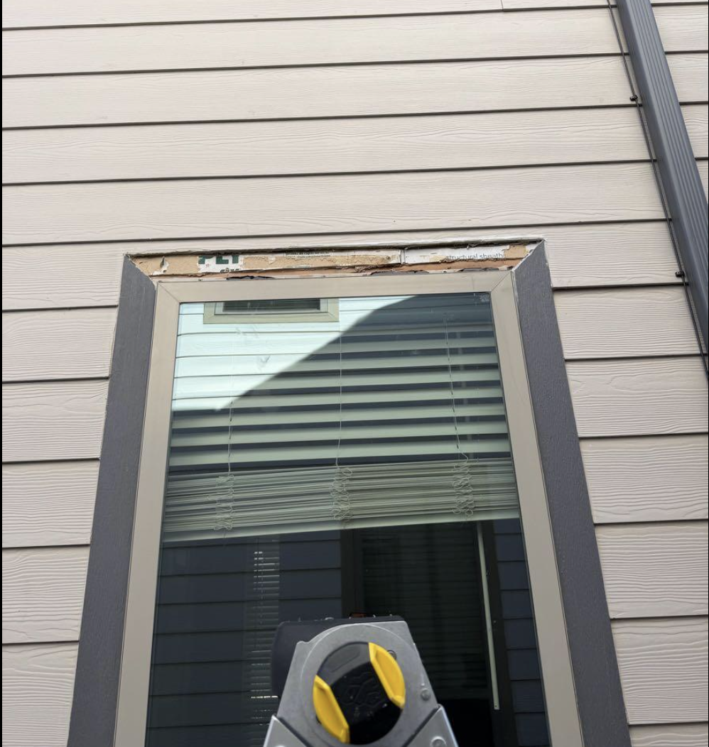 Window trim and siding — before