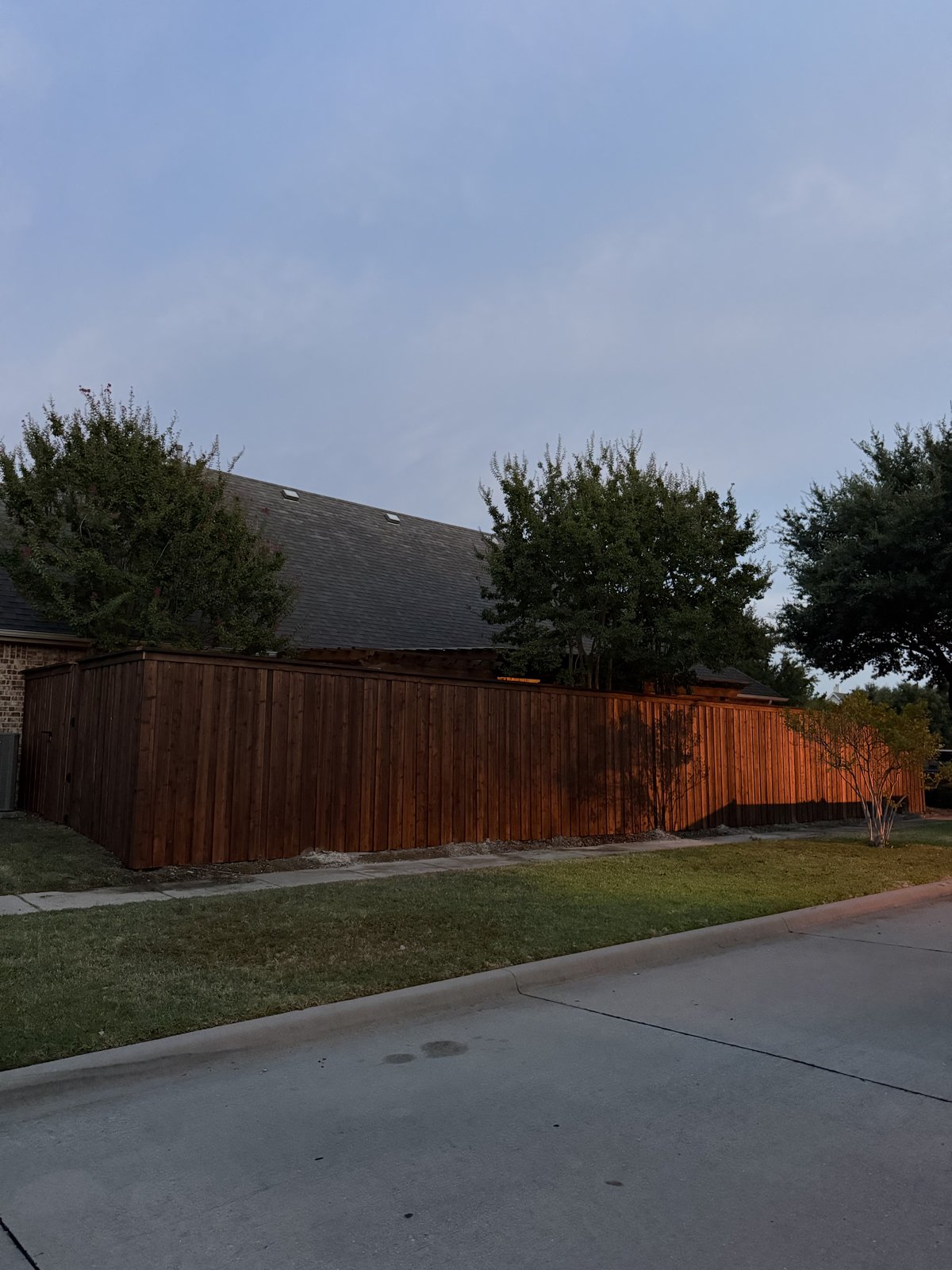 New wood fence and stone work — after