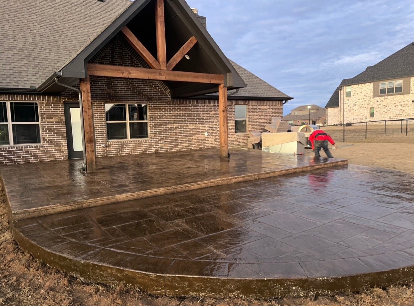 Stamped concrete patio extension with cedar pergola