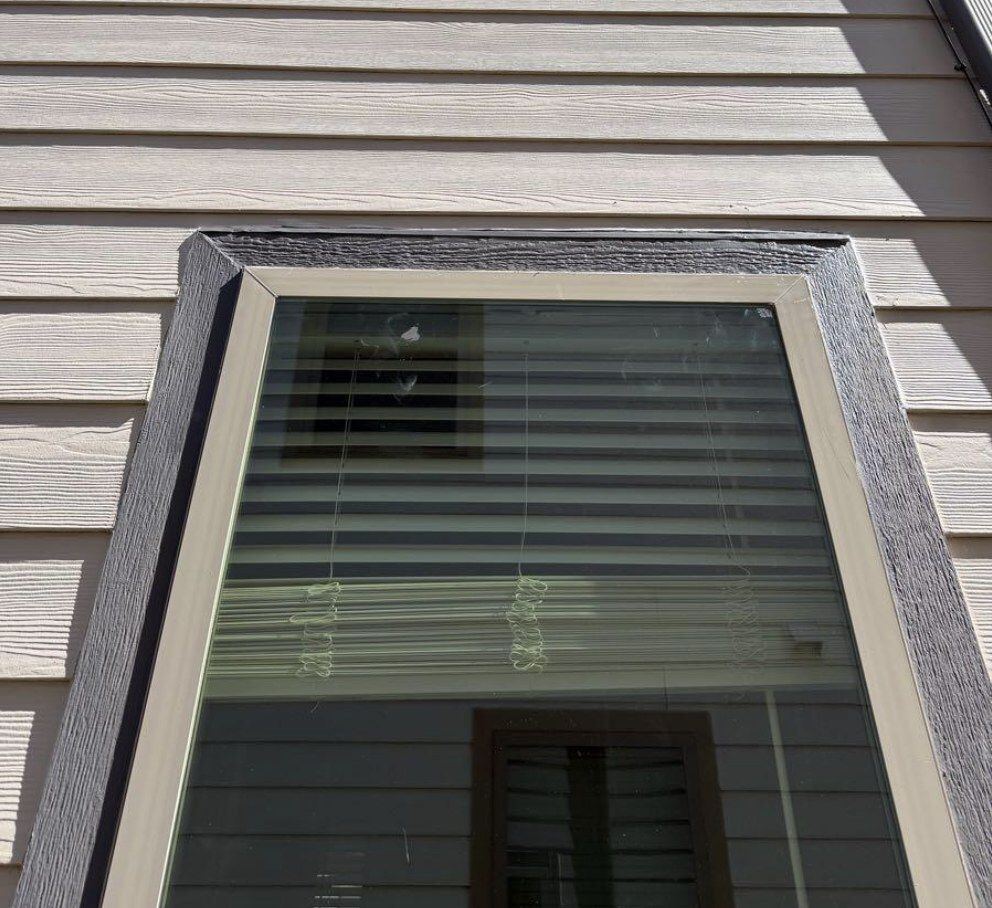 Window trim and siding — after